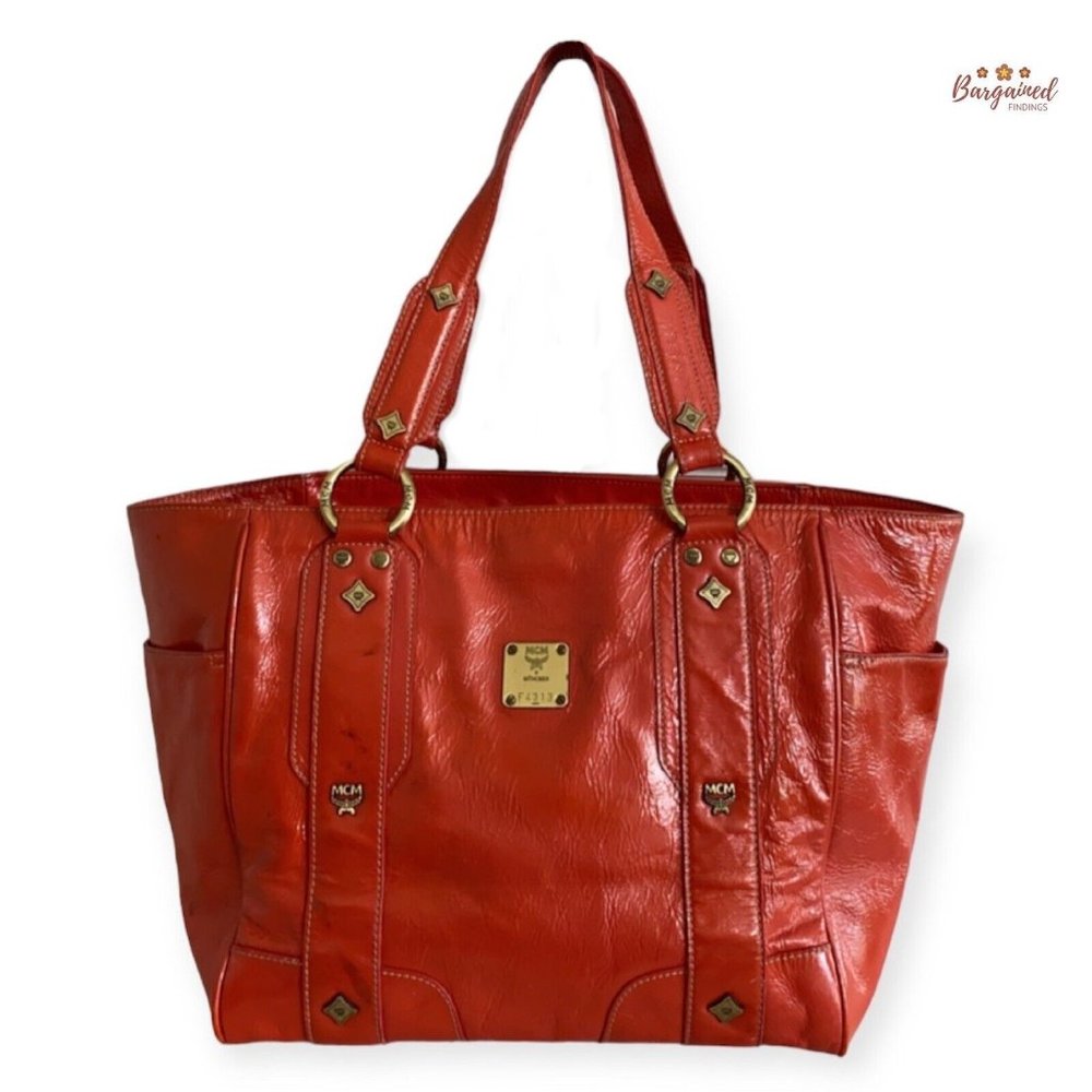 Authentic MCM Orange Distressed Patent Leather Studded Medium Shoulder Tote Bag